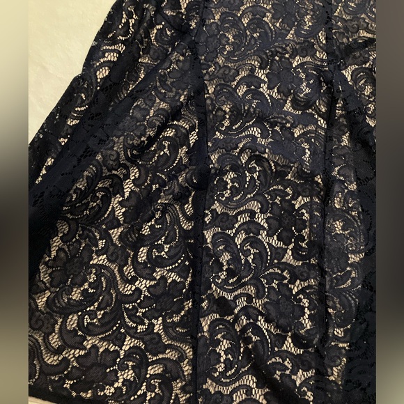 Black lace dress with nude background - Picture 2 of 6